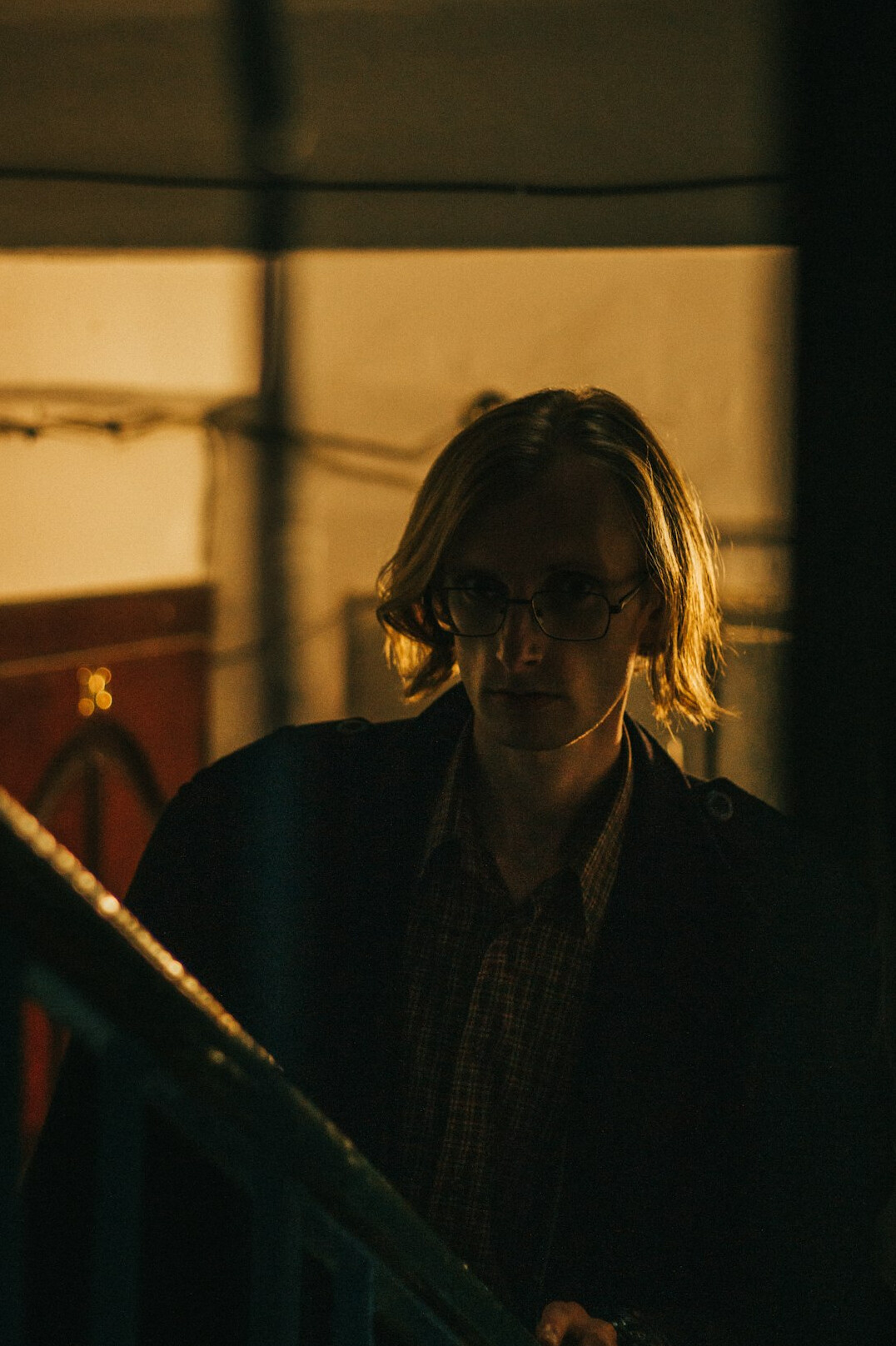 Portrait of a Danish male researcher and writer with glasses